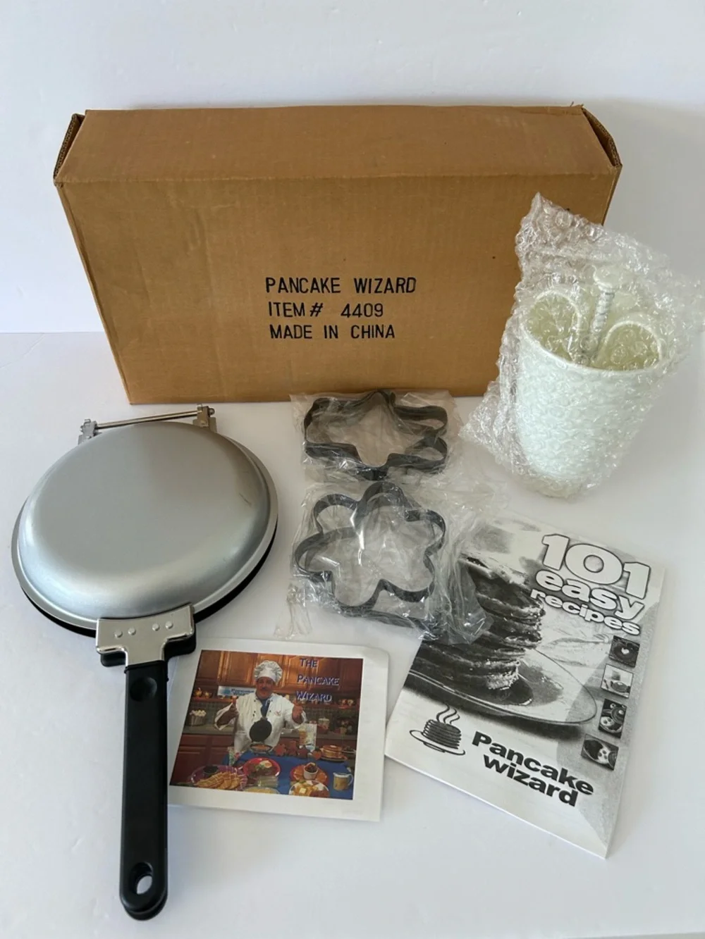 VTG “Pancake Wizard” Set includes: Pan, Batter Dispenser, Booklet, and 4 Shapes